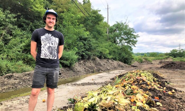 Co-founder Daniel Brown of Rust Belt Riders at the company’s composting yard in 2020. (Photo by Grant Segall)